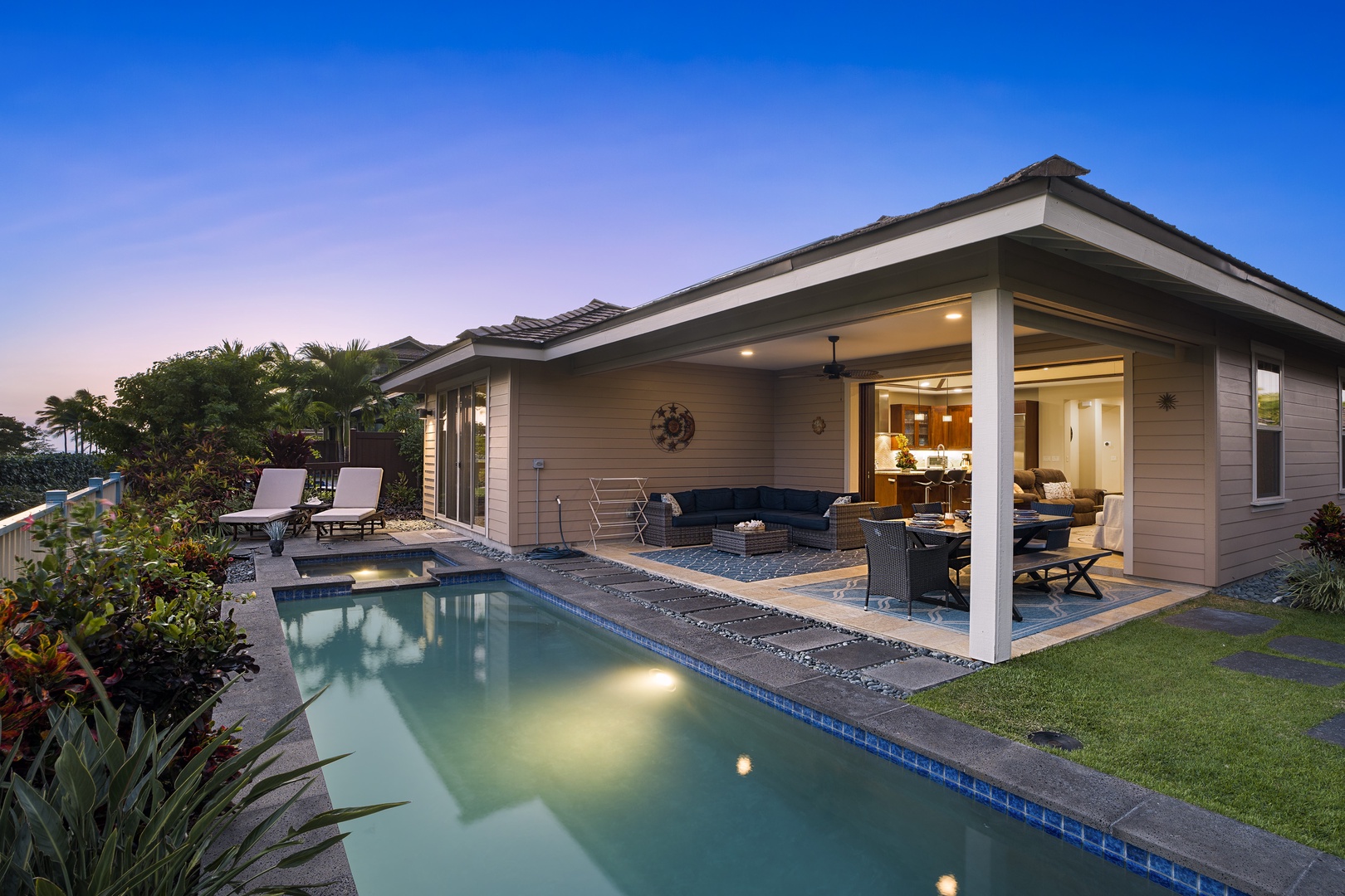 Kailua Kona Vacation Rentals, Kona Blue Vacations Holua Kai - Poolside at twilight at Kona Blue Vacations Holua Kai—the perfect setting to end a perfect Kona day.