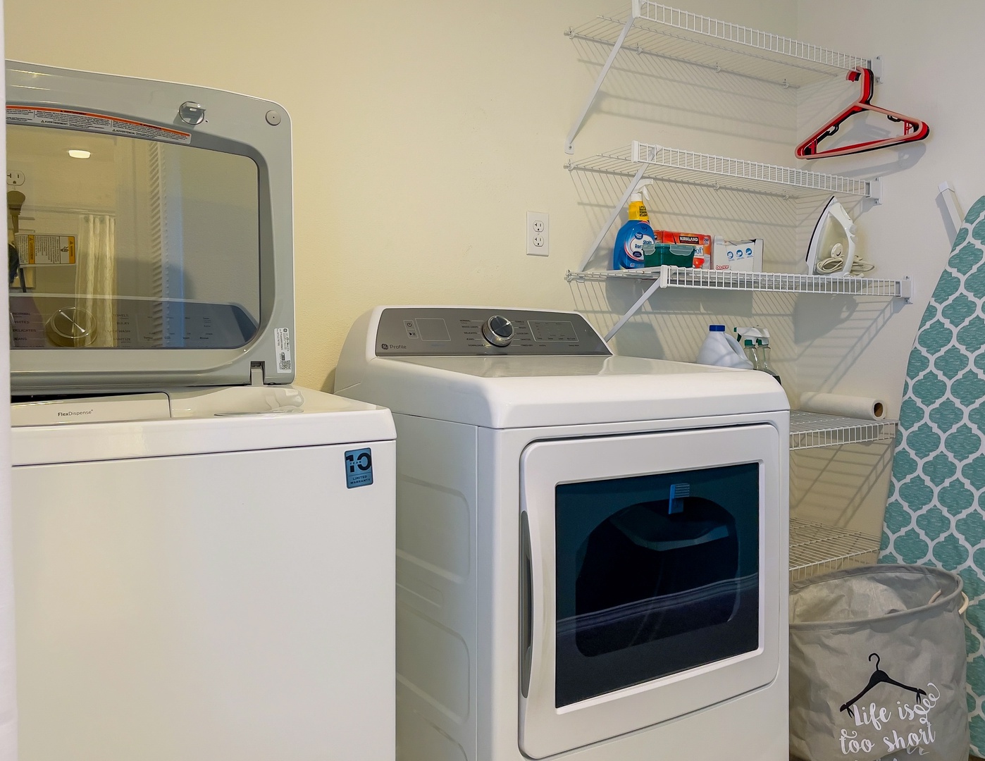 Waikoloa Vacation Rentals, Waikoloa Colony Villas 403 - Convenient laundry room equipped with washer, dryer, and storage.