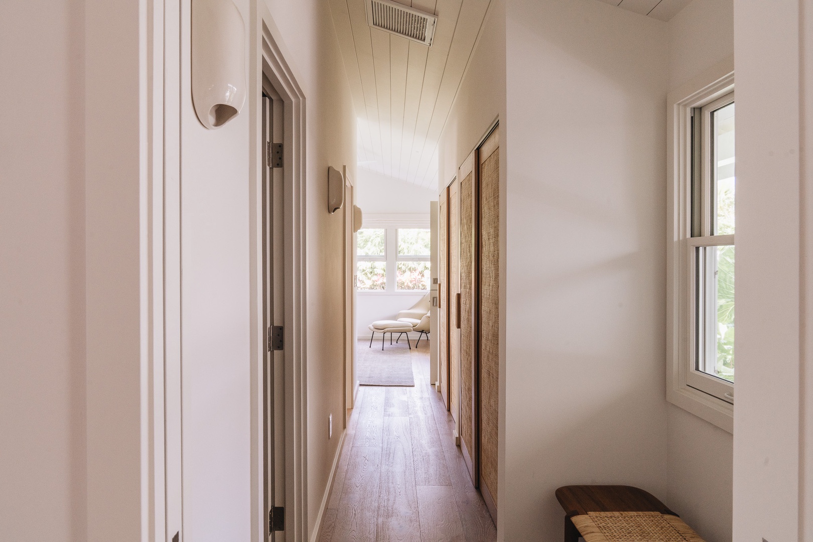 Honolulu Vacation Rentals, Surfside Bungalow** - Clean lines and natural light connect the home's thoughtfully designed living spaces.