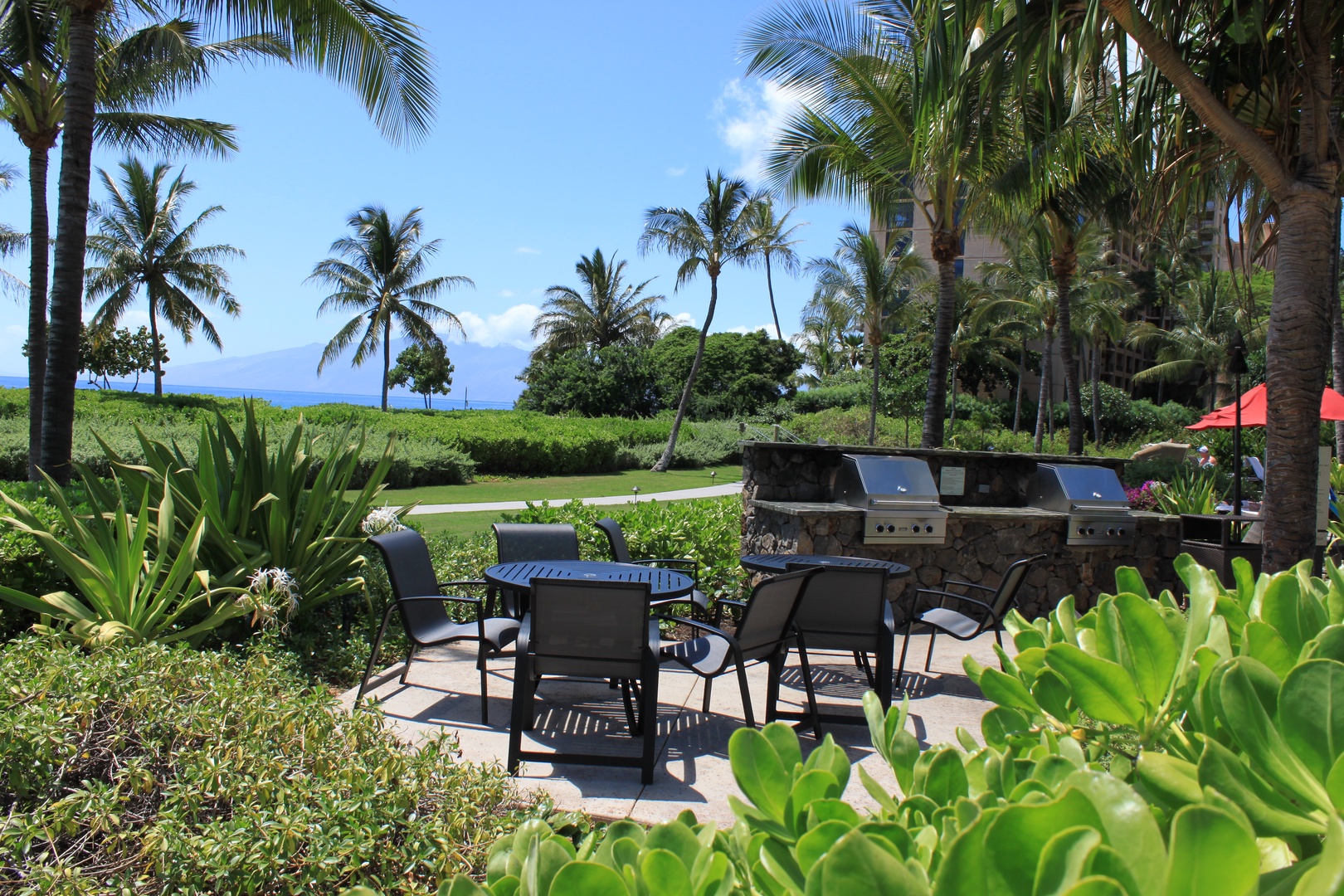 Lahaina Vacation Rentals, Honua Kai Konea 230 - Gather alfresco under swaying palms and sunny skies at Honua Kai Konea 230’s shaded BBQ area.