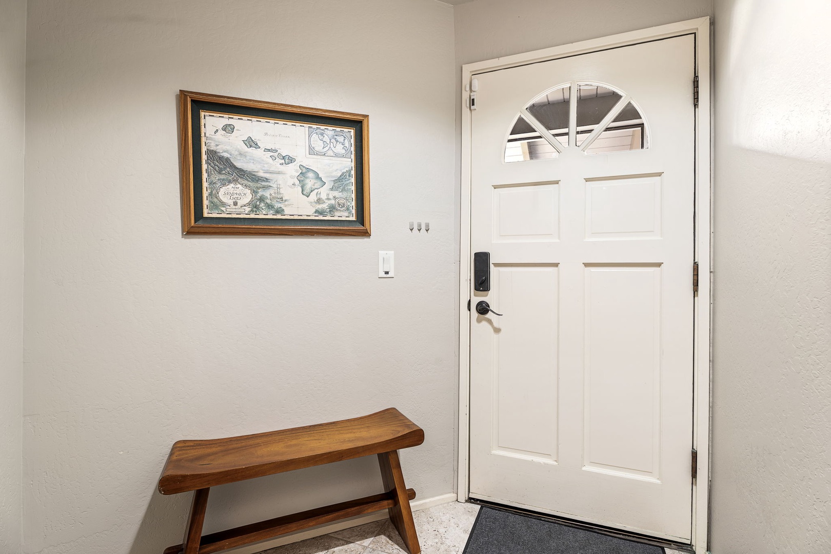Kailua Kona Vacation Rentals, Kanaloa at Kona 1606 - The front door opens to a bench and a place to set your bags down.