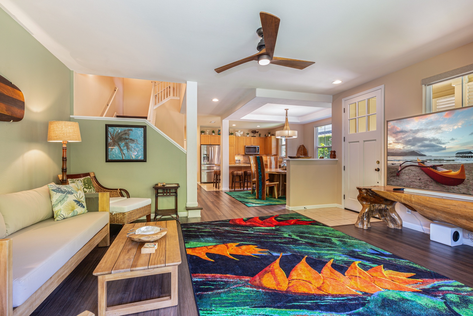 Princeville Vacation Rentals, Pualani Villa - The open floor plan seamlessly connects the living room to the dining and kitchen areas.