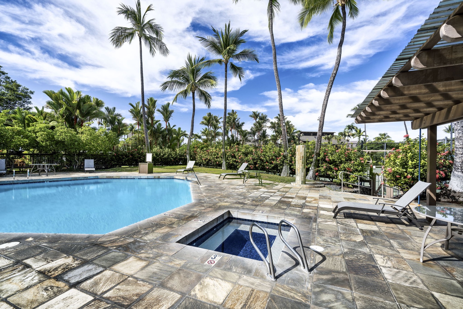 Kailua Kona Vacation Rentals, Kanaloa at Kona 1606 - Pool and hot tub side by side, loungers lined up in the sun.
