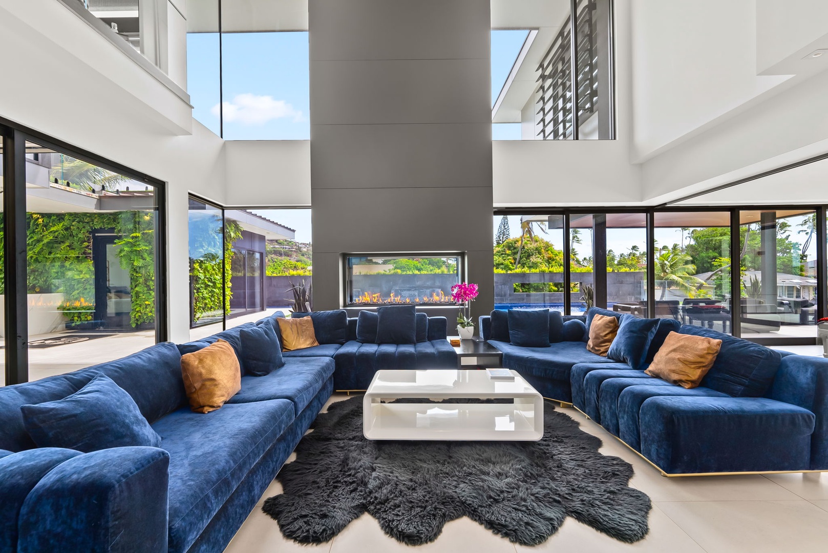 Honolulu Vacation Rentals, Ocean Villa 3 Bedroom - Gather around the fireplace and take in the garden views beyond.