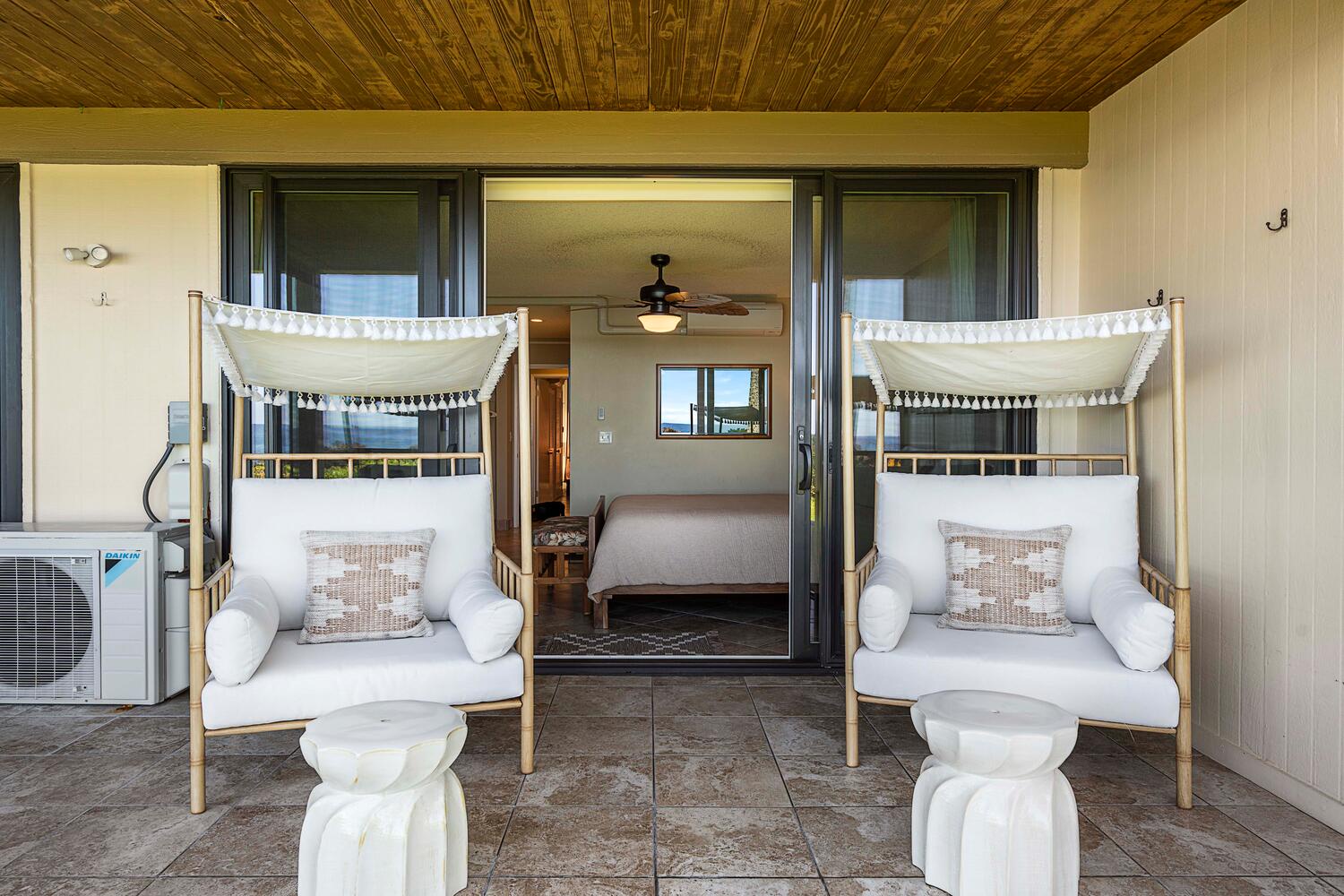 Kailua Kona Vacation Rentals, Keauhou Kona Surf & Racquet 1104 - Romantic lanai with two comfortable lounges – the perfect spot for couples to unwind and connect.
