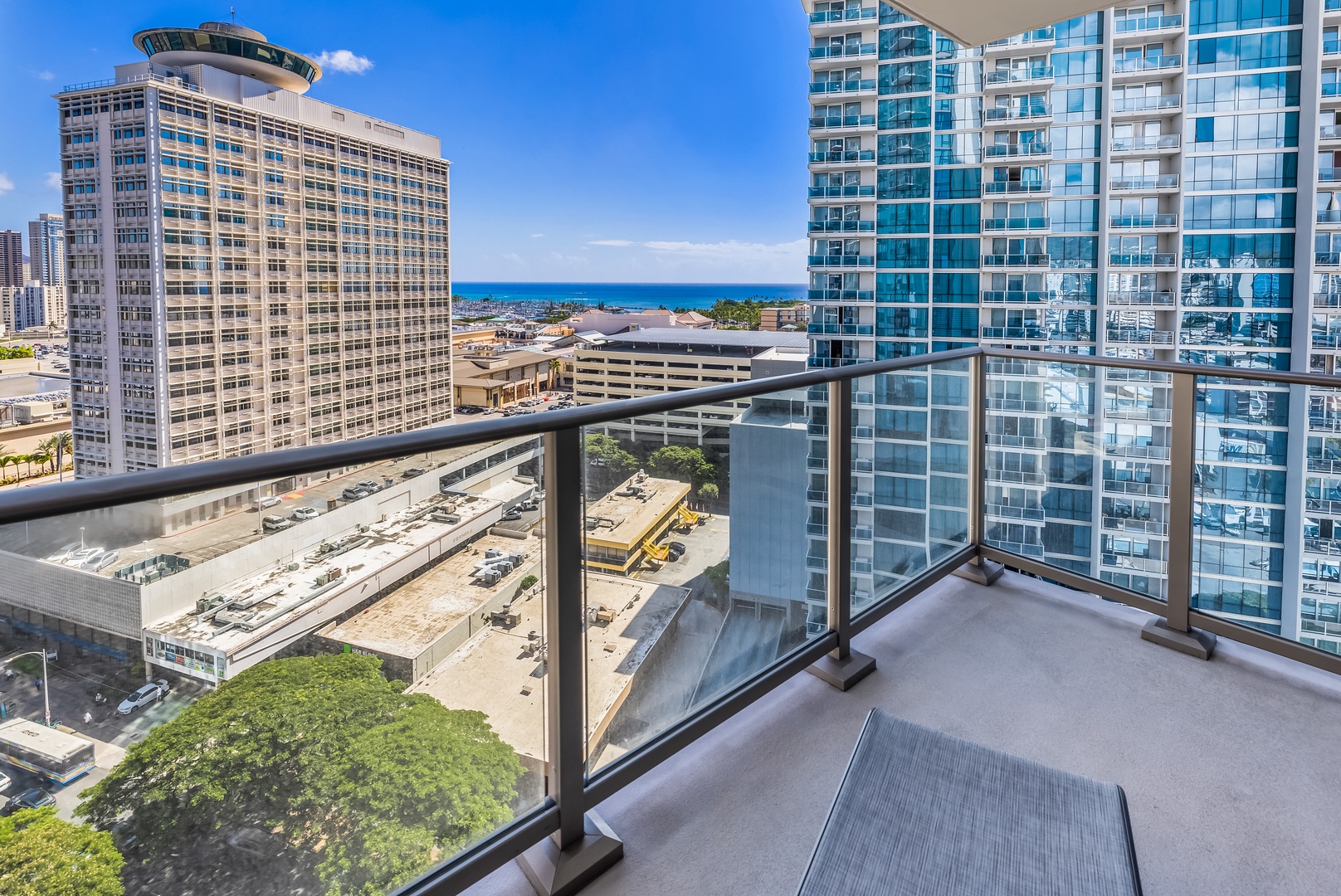 Honolulu Vacation Rentals, Sky Ala Moana #1701 - Private lanai with stunning city and partial ocean views, perfect for enjoying a morning coffee or sunset drink.