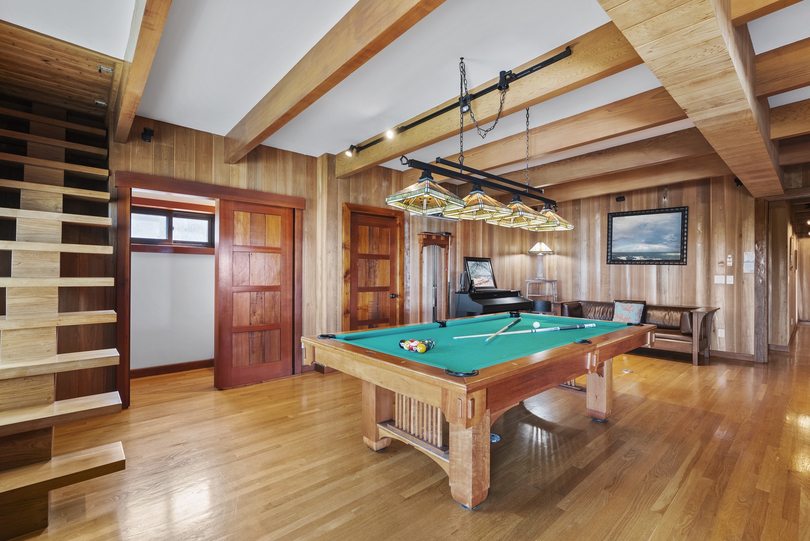 Haleiwa Vacation Rentals, Samurai House - Game room with a pool table and ample space for entertainment.