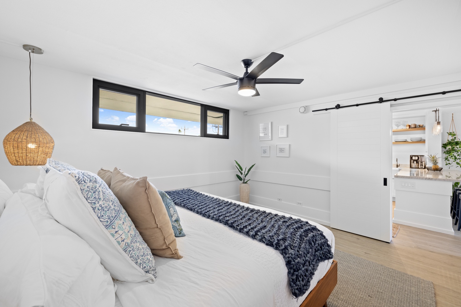 Honolulu Vacation Rentals, Hale Pono Waikiki - Unwind in this inviting bedroom featuring elegant linens, ample natural light, and minimalist decor for a tranquil stay.