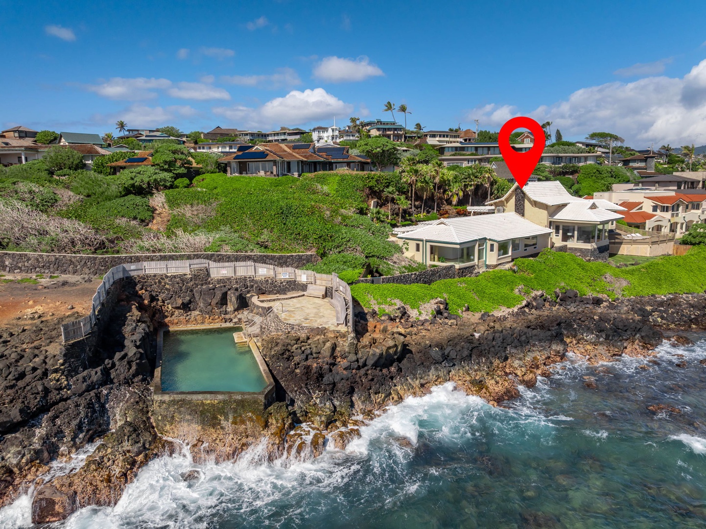 Honolulu Vacation Rentals, Black Point Ocean Villa - Oceanfront location with natural lava rock pool and scenic coastal community views on this tropical island setting.