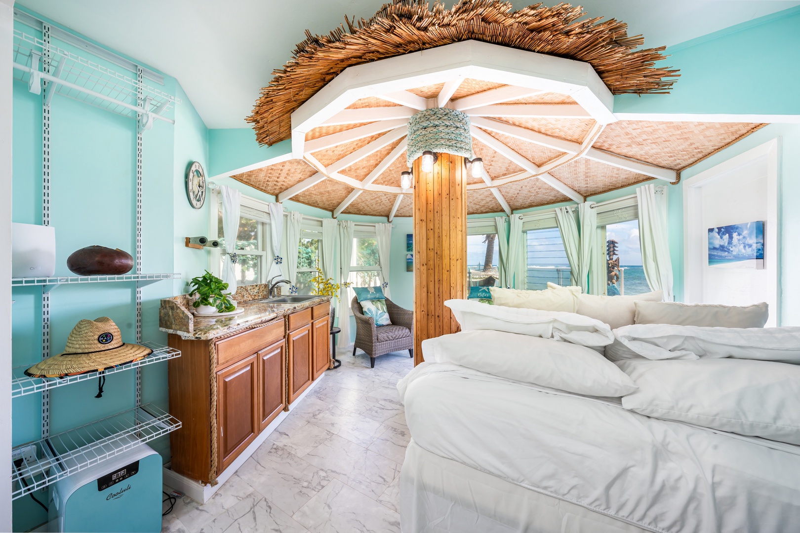 Hauula Vacation Rentals, Private Beach Paradise - Unique bedroom with a thatched palapa ceiling and soft ocean breezes throughout.