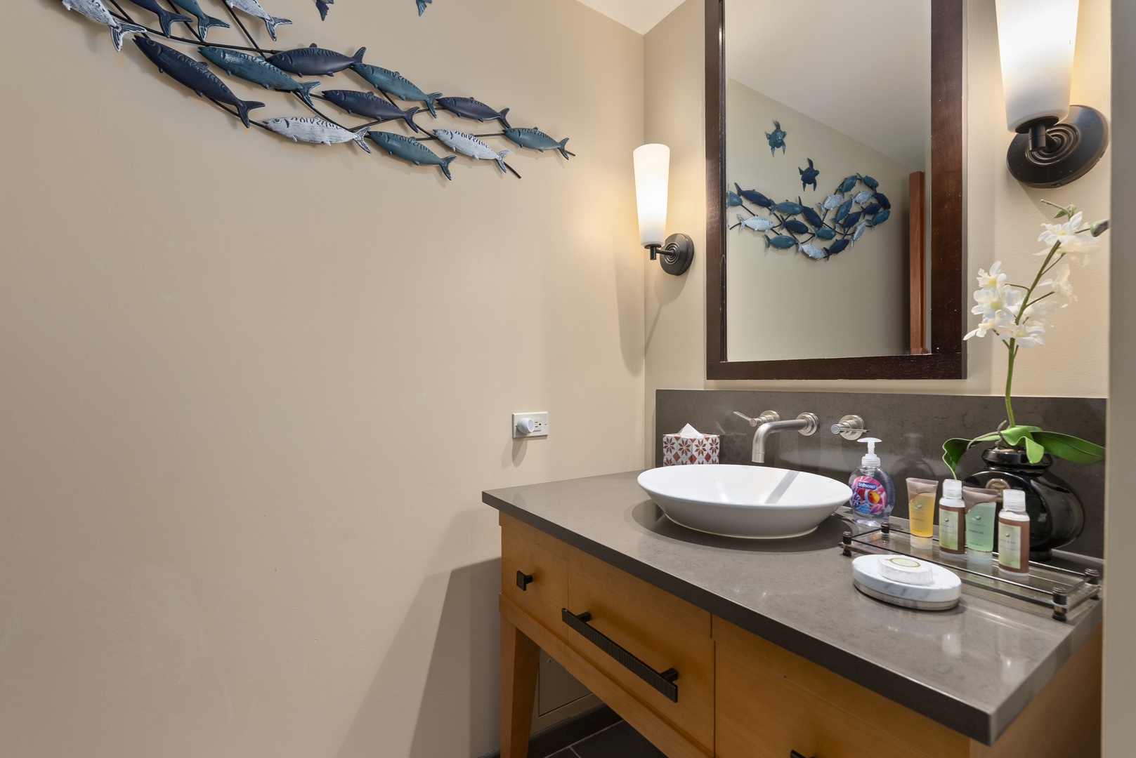 Kapolei Vacation Rentals, Ko Olina Beach Villas O1404 - A vessel sink under playful art, quick to freshen up between the beach and out.