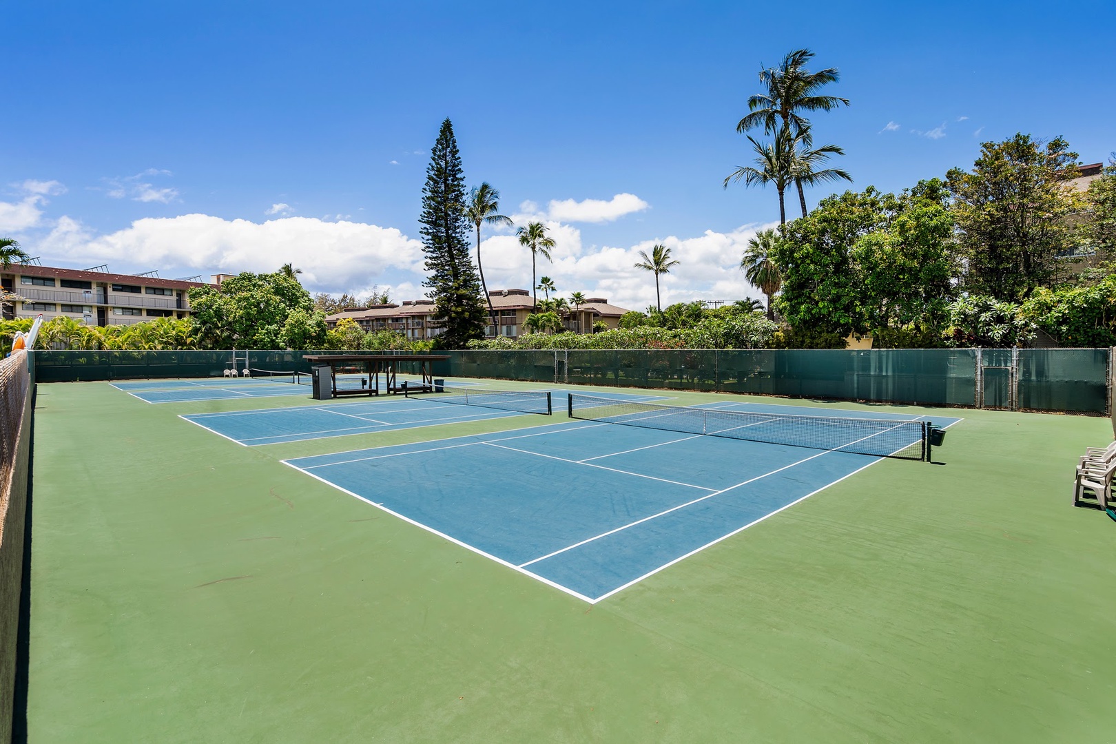 Kihei Vacation Rentals, Kamaole Sands 5310 - Pick up a racket for the tennis and pickleball courts, fenced into their own corner of the grounds.