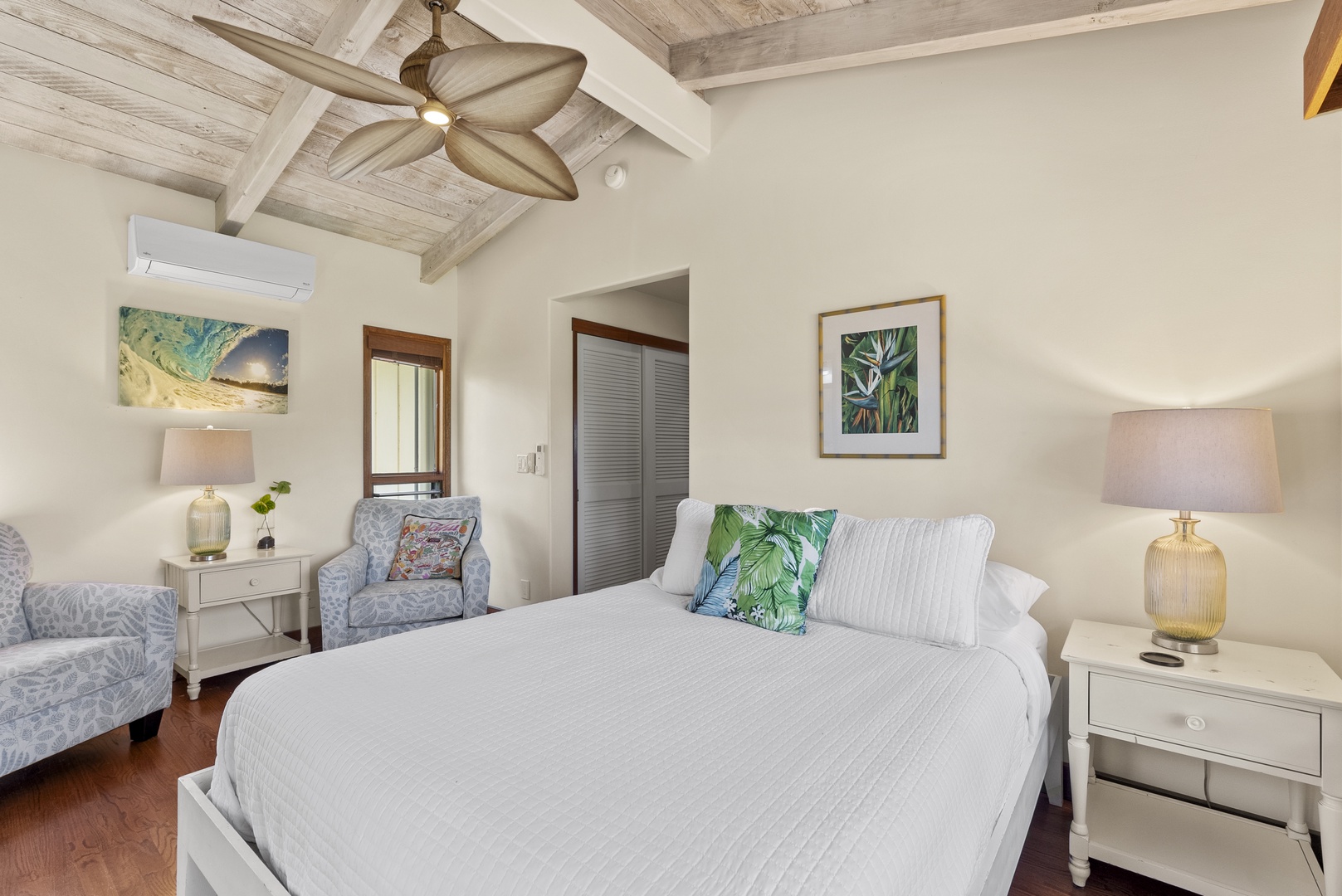 Haleiwa Vacation Rentals, Maluhia Beach House - Tranquil bedroom with a queen-size bed, vaulted ceilings, and soft natural light.