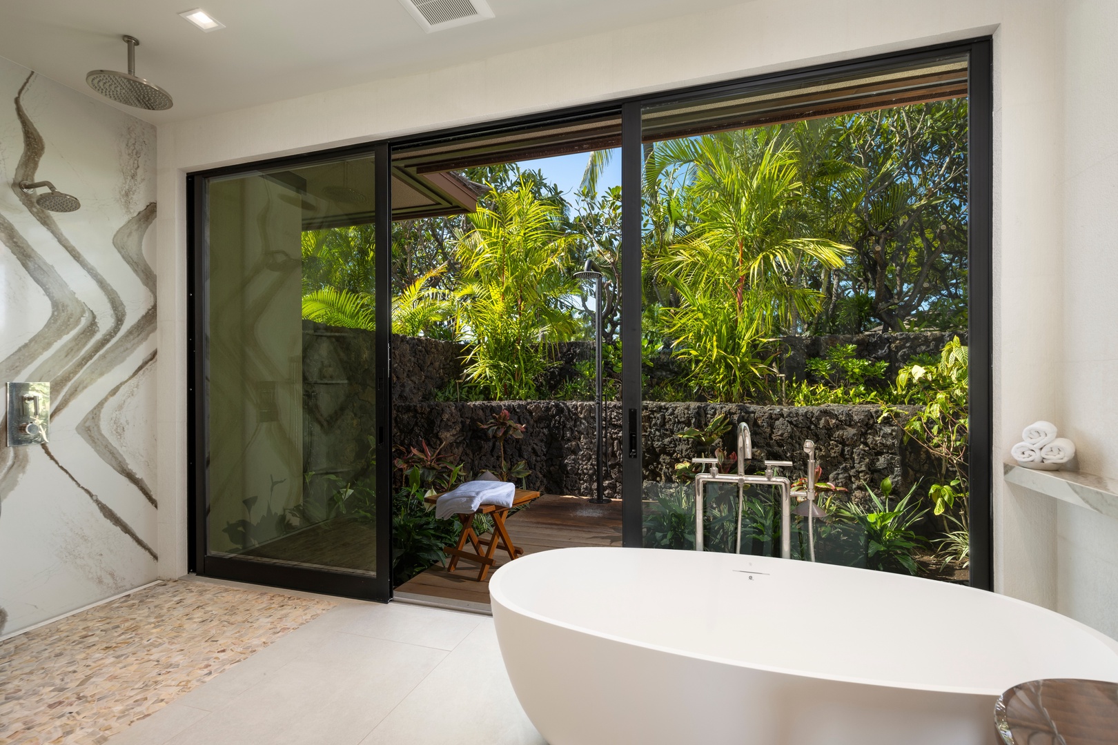 Kailua-Kona Vacation Rentals, 4BD Ka'Ulu Estate (102A) at Hualalai Resort - Primary Suite #1: Soak in your private freestanding tub while gazing at tropical gardens through floor-to-ceiling windows.