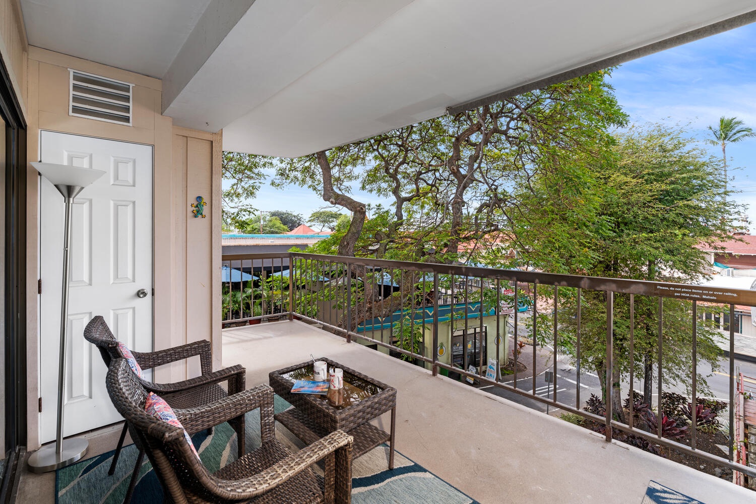 Kailua Kona Vacation Rentals, Kona Plaza 201 - Comfortable seating while enjoying garden and neighborhood views.