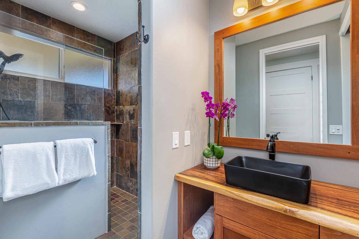 Princeville Vacation Rentals, Pohaku Villa - The downstair shared bathroom has single vanity and separate shower.