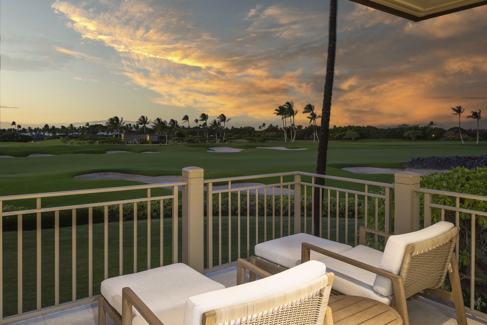 Kailua Kona Vacation Rentals, 3BD Palm Villa (130B) at Hualalai Resort - Unwind on your private lanai as golden sunsets paint the sky above the golf course, creating the perfect backdrop for evening relaxation.