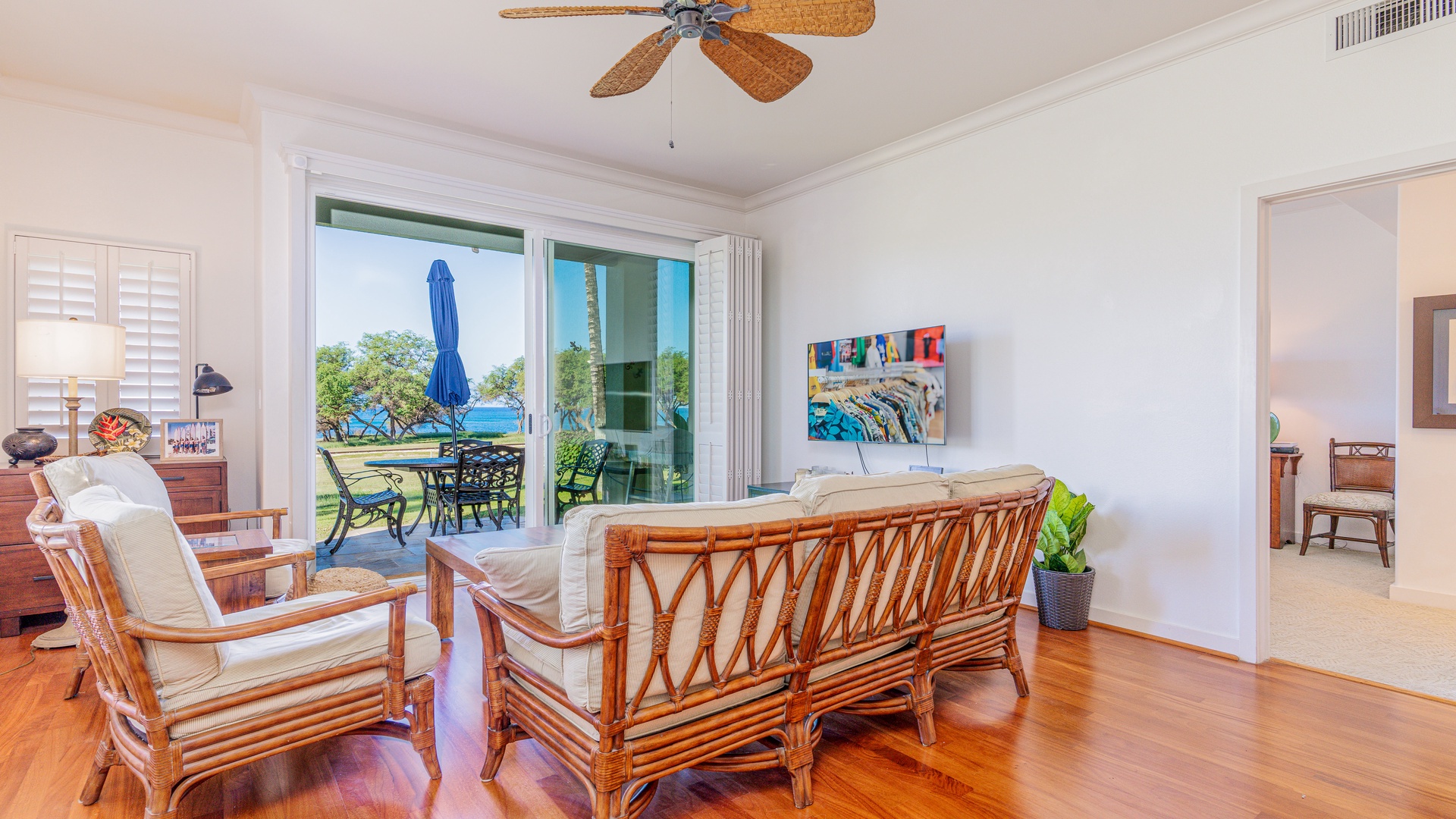 Kapolei Vacation Rentals, Kai Lani 24B - Sink in to the living room couch for a view of the lanai and ocean breezes.