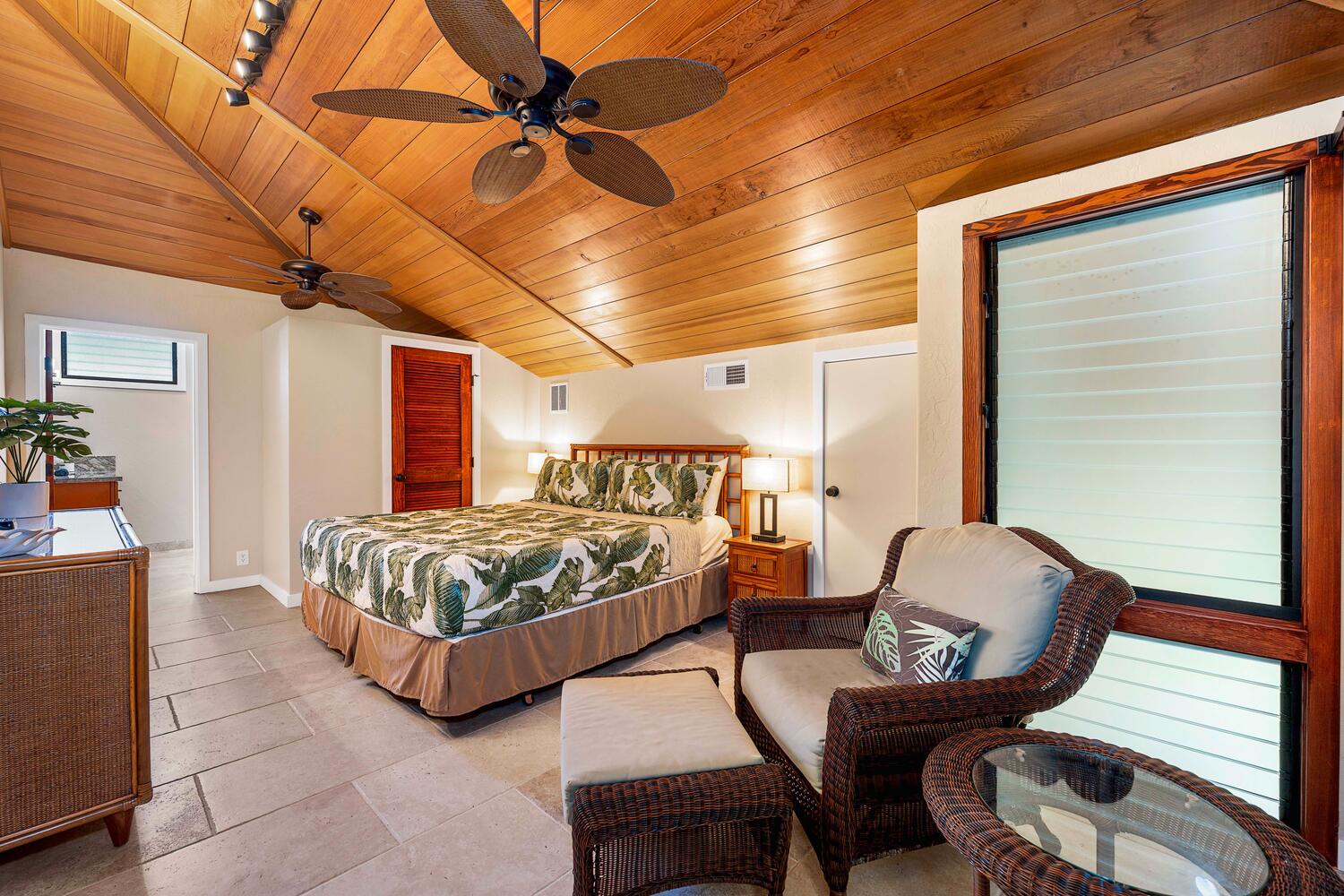 Kailua Kona Vacation Rentals, Kanaloa at Kona 3303 - Rest comfortably in the spacious bedroom with a ceiling fan and cozy seating area.