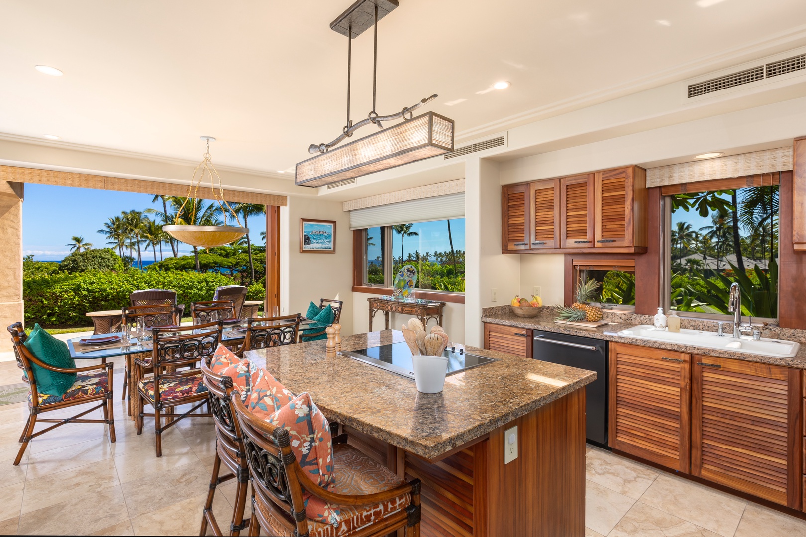 Kailua Kona Vacation Rentals, 2BD Hillside Villa (4102) at Hualalai Resort - Gourmet kitchen with granite countertops, Koa cabinetry, and a central prep island.