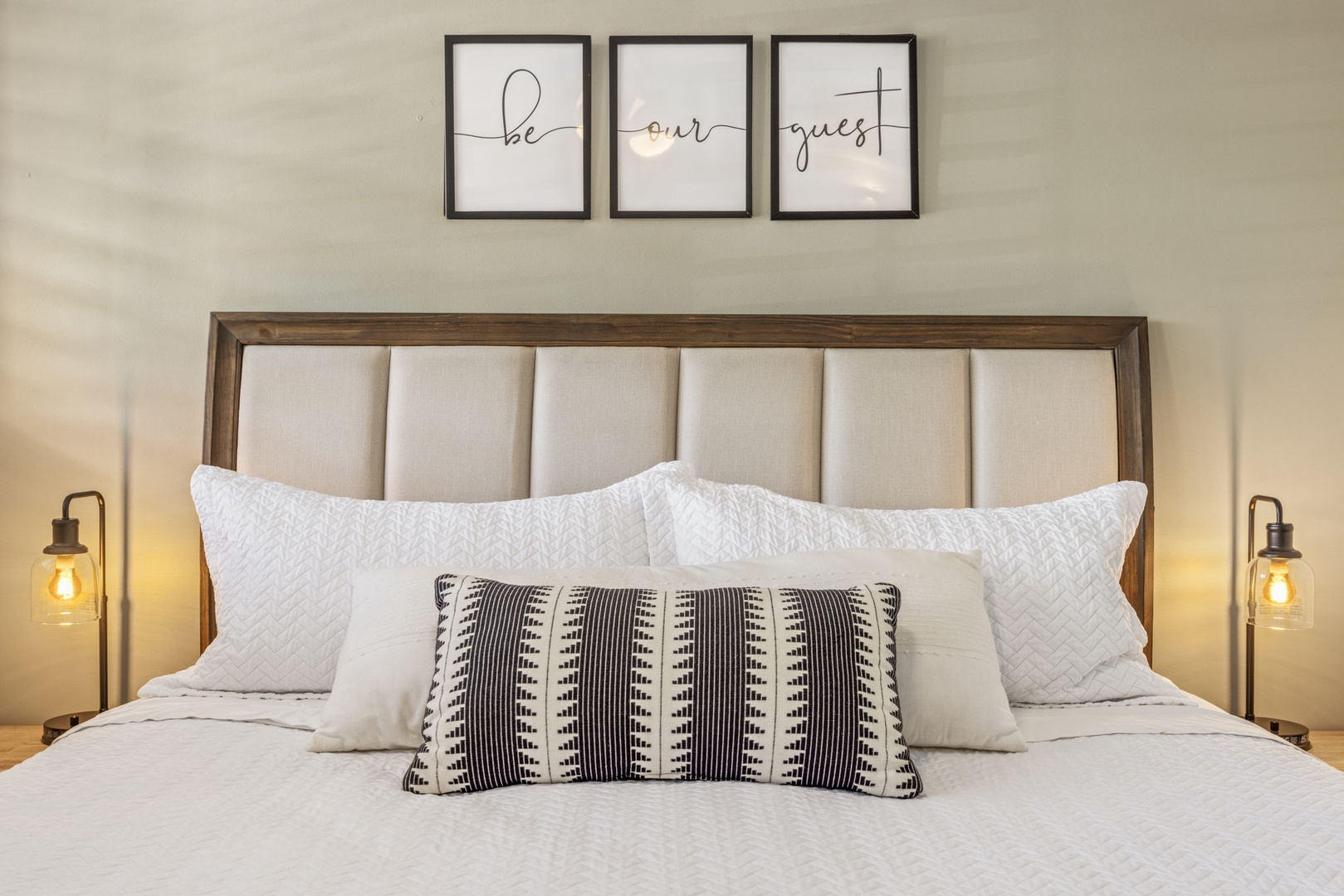 Wailuku Vacation Rentals, Milowai 310 - Wake up under the three framed prints spelling out the welcome above the bed.