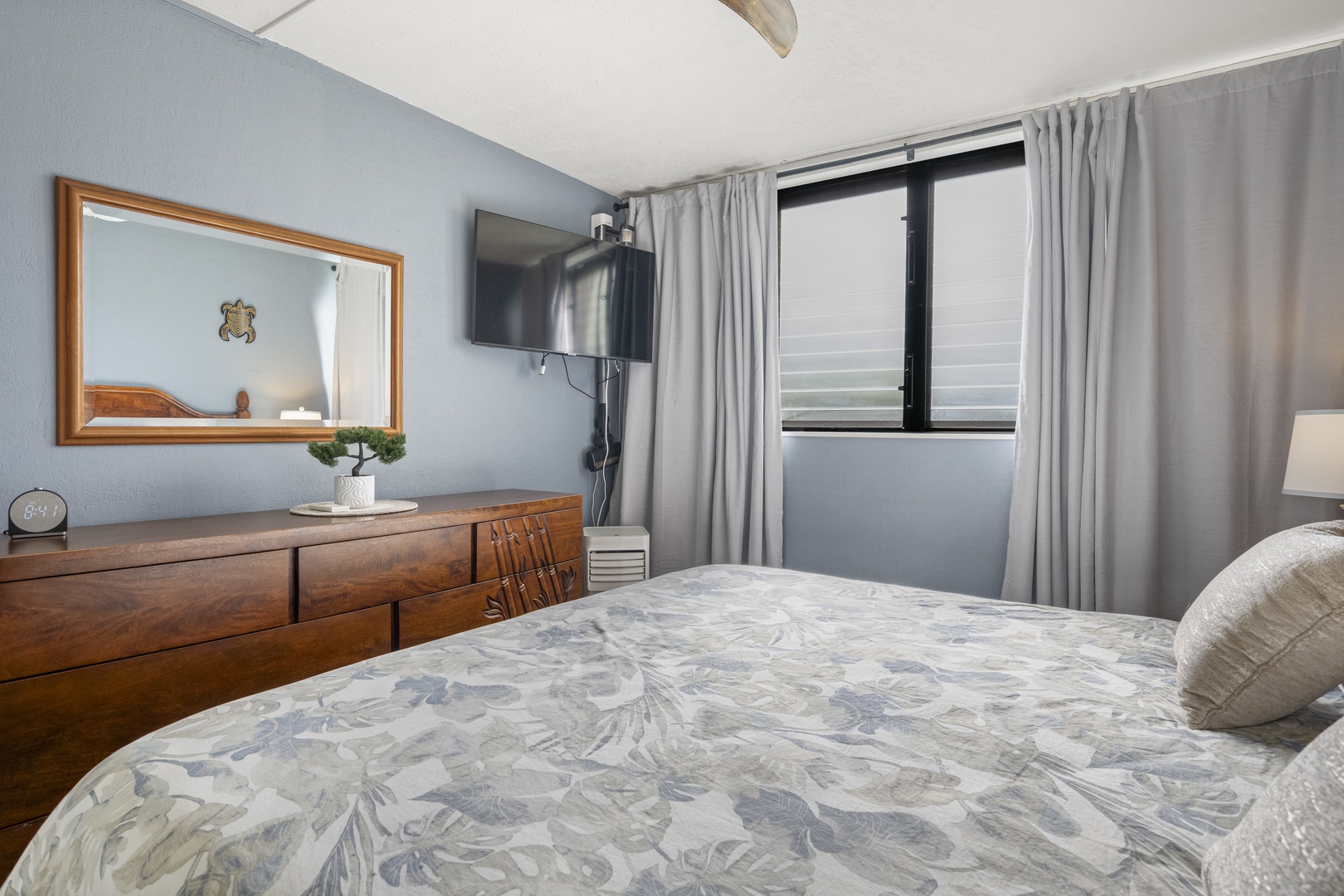 Lahaina Vacation Rentals, Polynesian Shores 114 - A dresser, a mirror, and a spot for the TV make it easy to settle in.