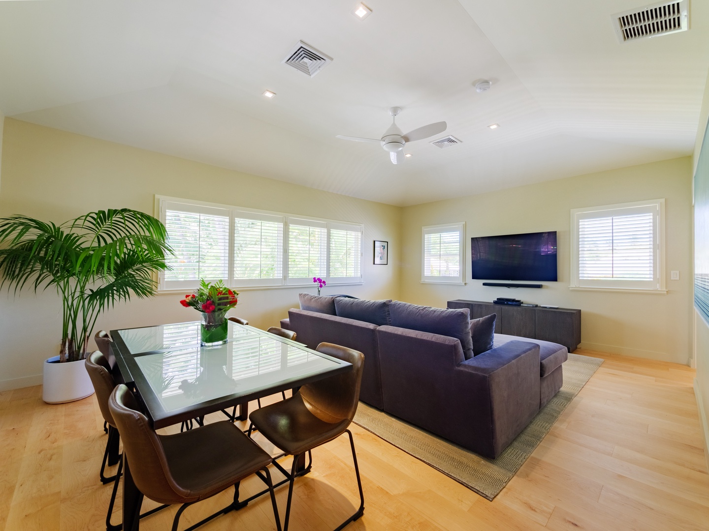 Honolulu Vacation Rentals, Paradise Beach Estate - Unwind in the cozy family den, where heartfelt memories are made, stories are shared, and relaxation is second nature.
