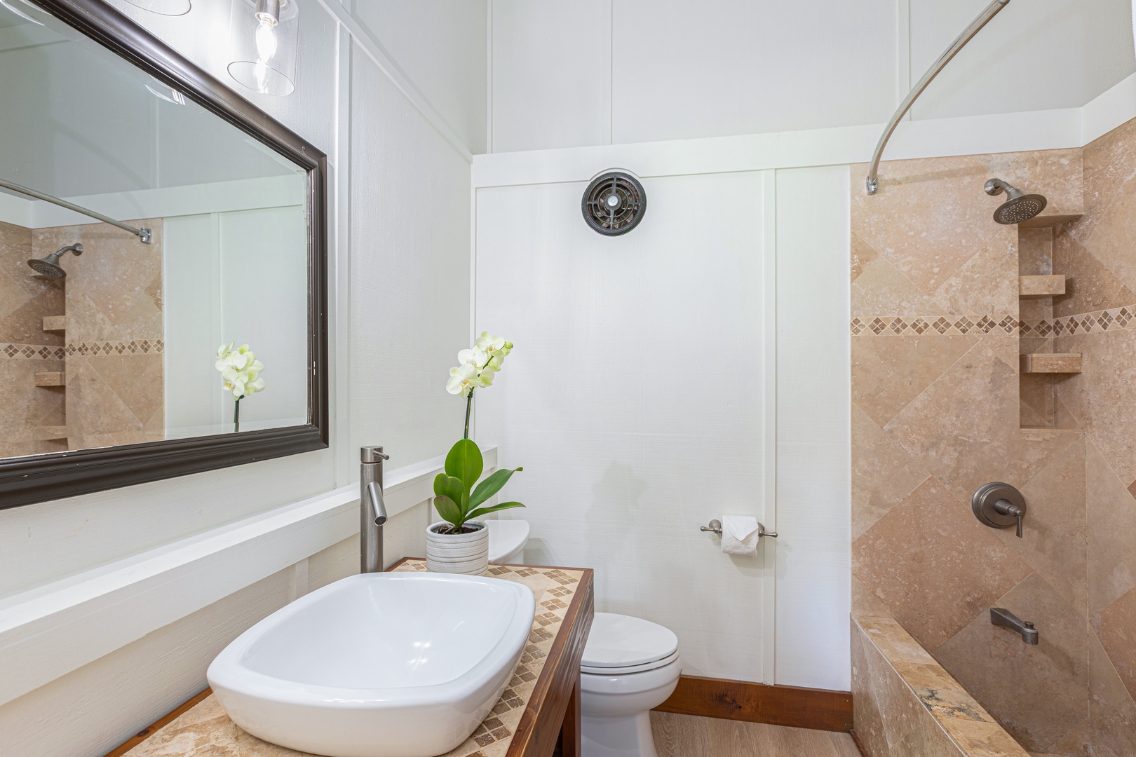 Princeville Vacation Rentals, Mauna Kai 11 - Dedicated en-suite for the lockout suite, featuring walk-in shower and tropical island accents.