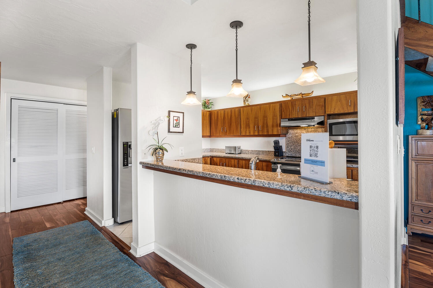 Kailua Kona Vacation Rentals, Kanaloa at Kona 3304 - Casual breakfast bar and pendant lighting for morning coffee or quick bites.