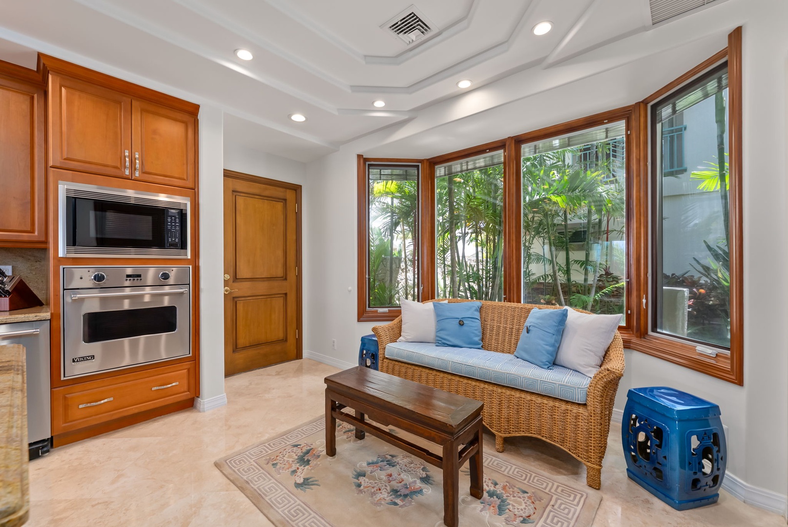 Honolulu Vacation Rentals, Maunalua Estate - Tropical greenery and soft natural light create a calm, welcoming space to unwind indoors.