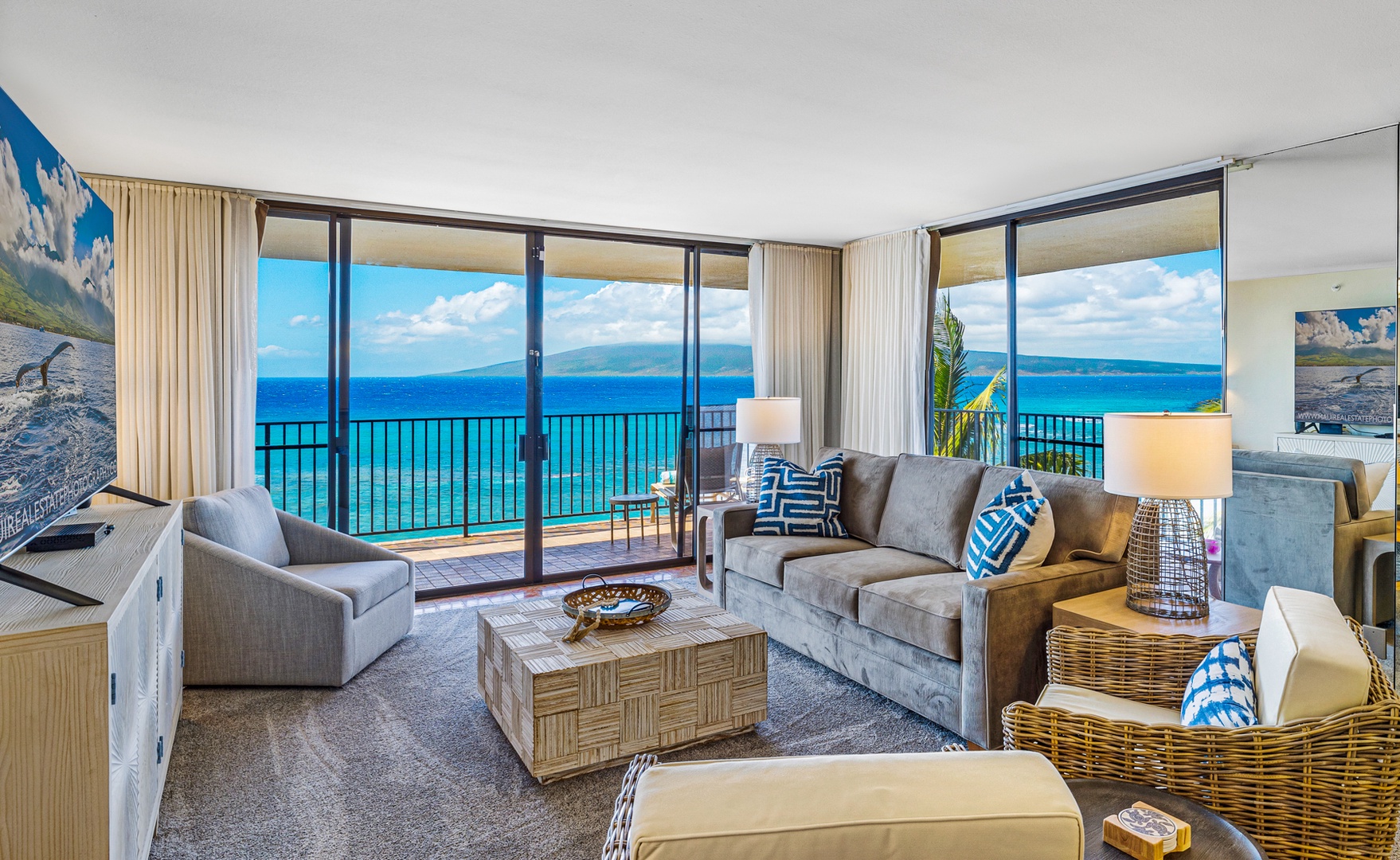 Lahaina Vacation Rentals, Kaanapali Shores 502 - The living room offers panoramic ocean views through floor-to-ceiling windows, creating a serene space for relaxation.