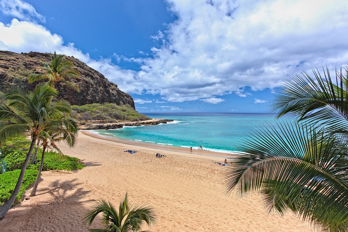 Waianae Vacation Rentals, Makaha - Hawaiian Princess - 305 - Breathe in the fresh ocean air under swaying palm trees on the beach.
