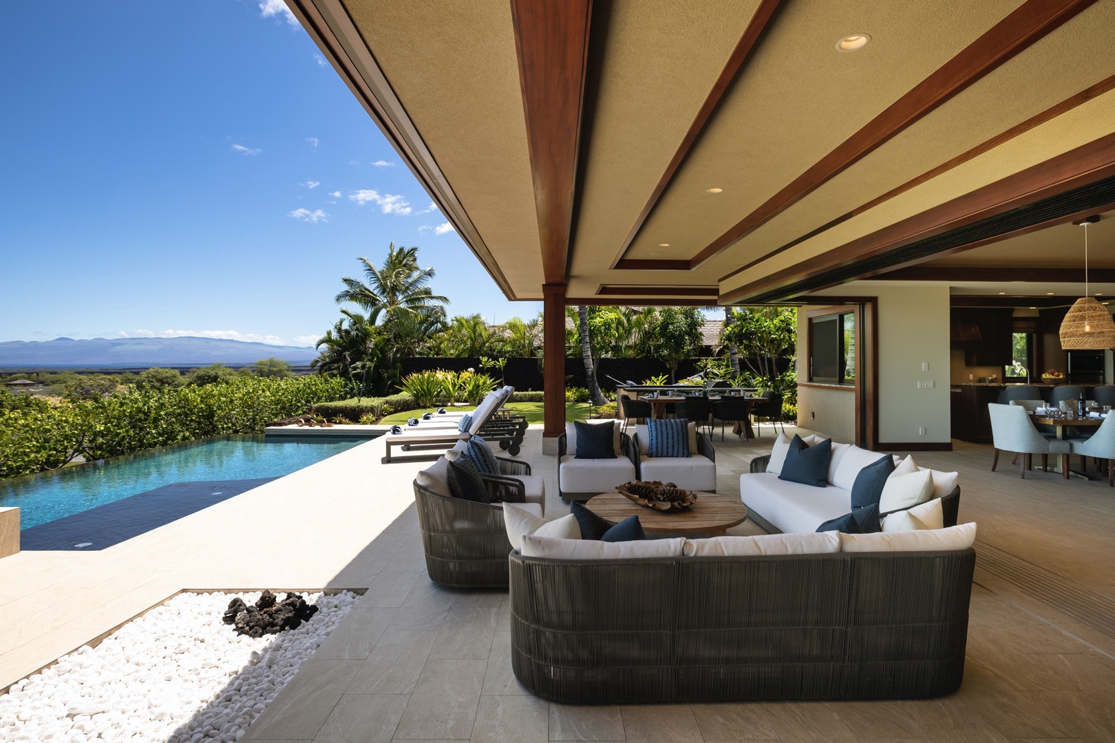 Kailua Kona Vacation Rentals, 4BD Kulanakauhale (3558) Estate Home at Four Seasons Resort at Hualalai - Great room transitions seamlessly onto the spacious lanai with ample lounge seating and panoramic coastline views.