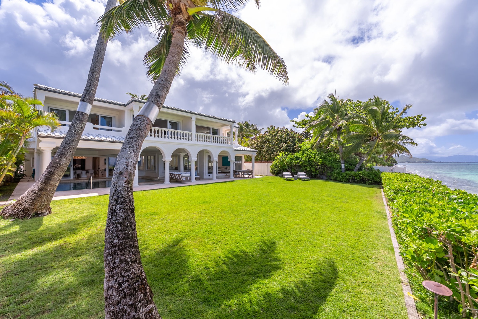 Kailua Vacation Rentals, Lanikai Sunrise Estate - Welcome to Mokulua Sunrise Estate, where manicured lawns meet the soft sands of iconic Lanikai Beach.
