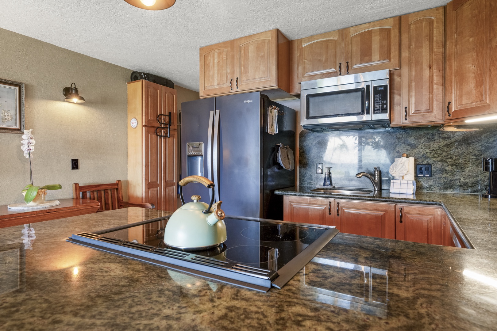 Lahaina Vacation Rentals, Polynesian Shores 114 - Prep dinner on granite counters with full-size appliances right at hand.