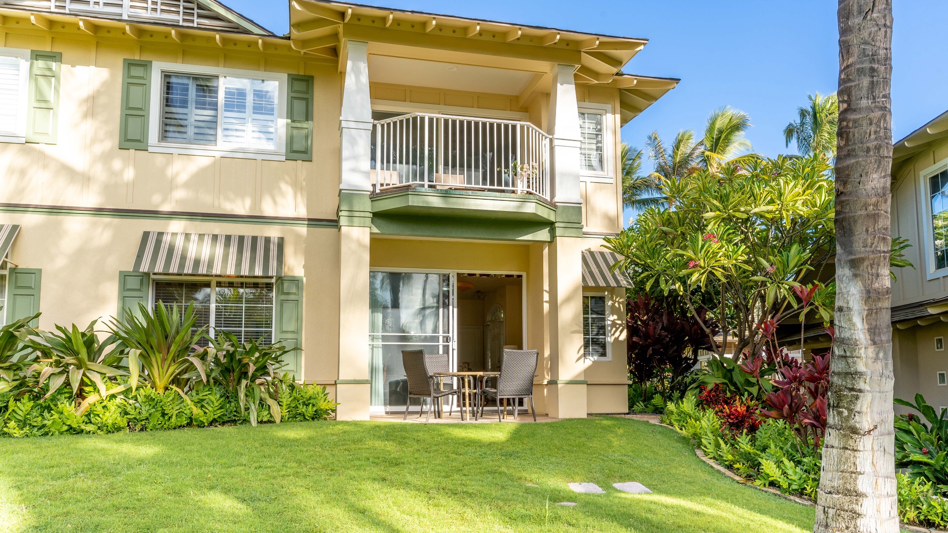 Kapolei Vacation Rentals, Kai Lani 8B - The tranquil back yard where you can dine al fresco under swaying palm trees.