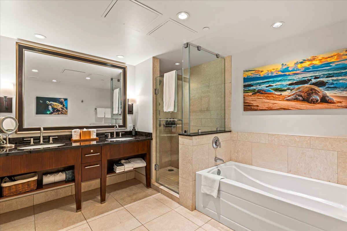 HI Vacation Rentals, Honua Kai Hokulani 825 - Indulge in relaxation with a spacious walk-in shower and a luxurious soaking tub in the primary bathroom.