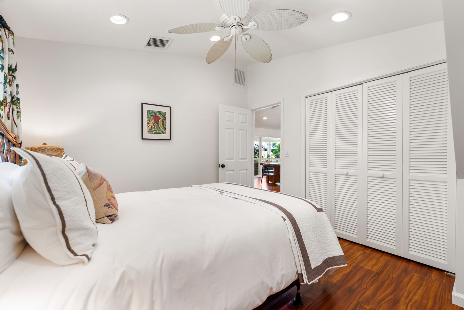 Kailua Vacation Rentals, Nohie Lanikai - Relax in this inviting bedroom featuring a queen-size bed and soft tropical accents.