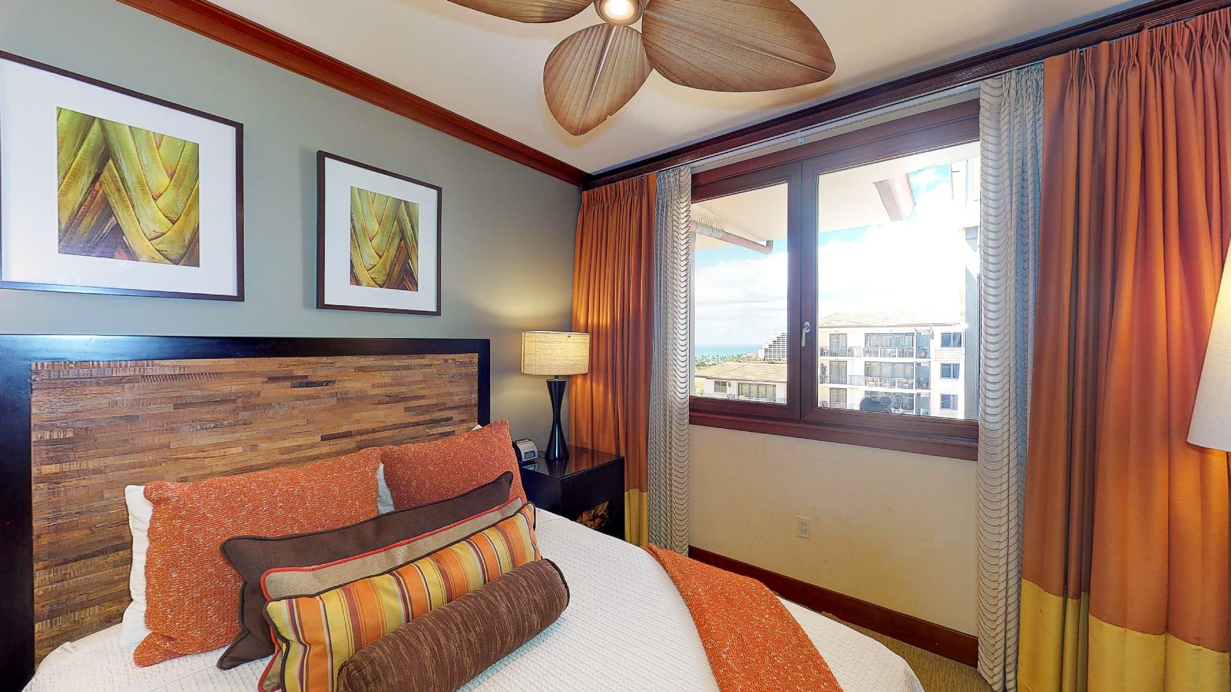 Kapolei Vacation Rentals, Ko Olina Beach Villas O1121 - The second guest bedroom with a queen bed and a view.