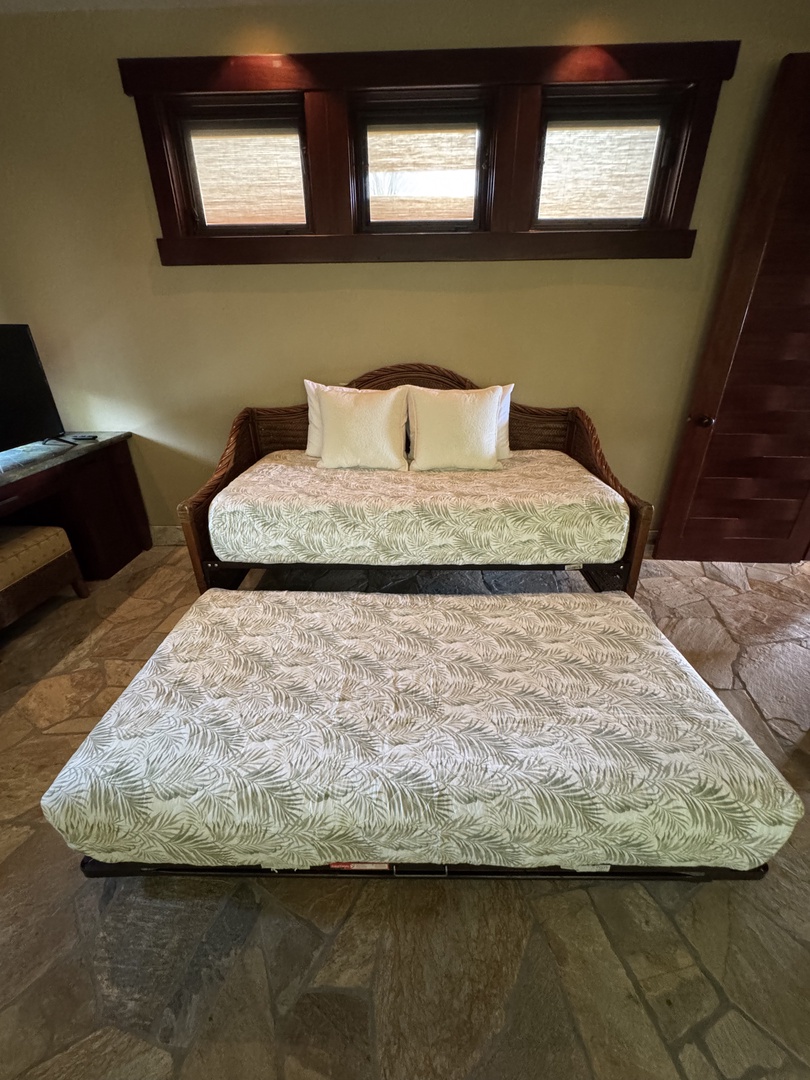 Kamuela Vacation Rentals, Hale Konane - A versatile convertible bed offers flexible sleeping arrangements for guests.