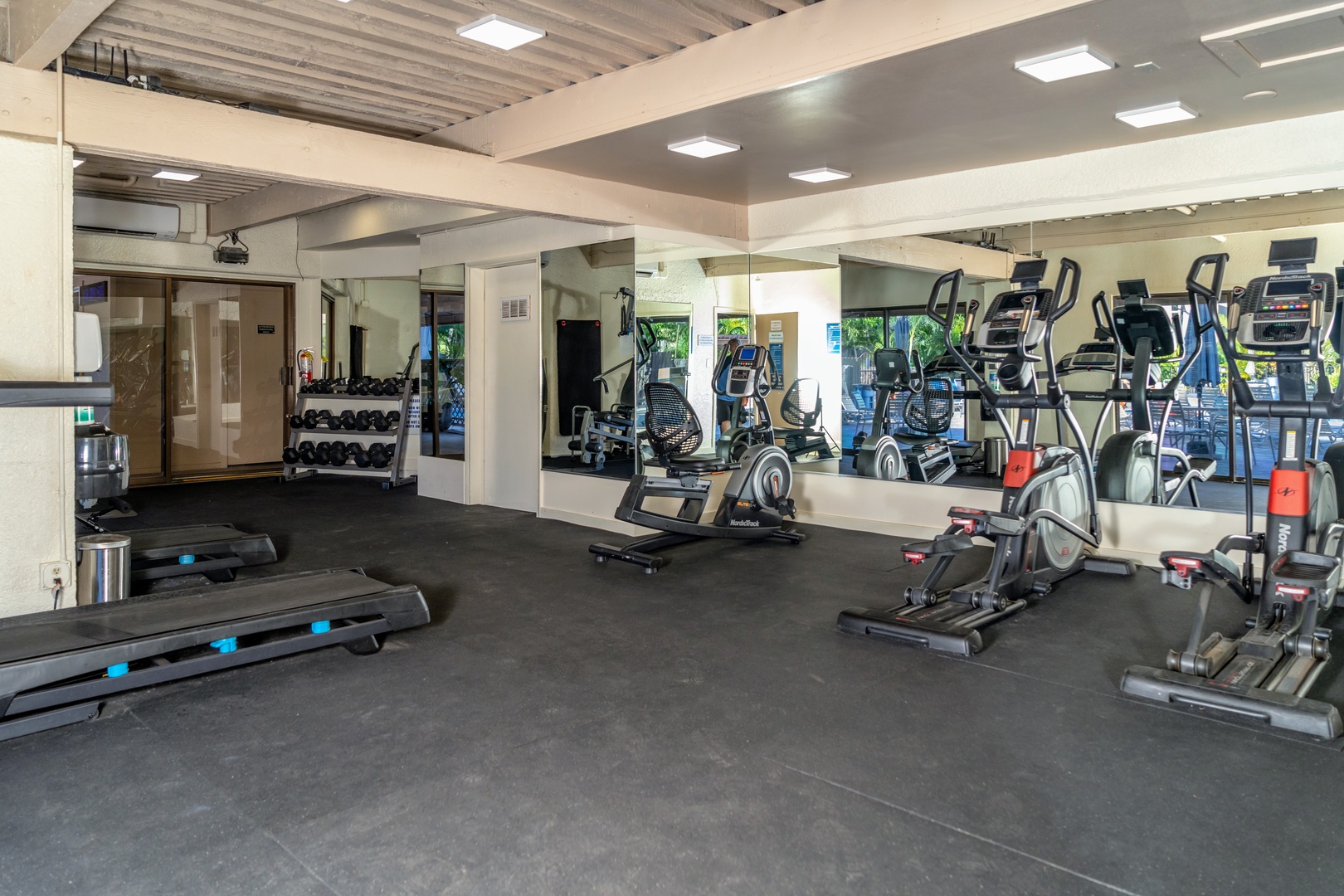 Kihei Vacation Rentals, Kamaole Sands 5310 - Get a workout in without leaving the complex, treadmills and ellipticals lined up under the covered gym.