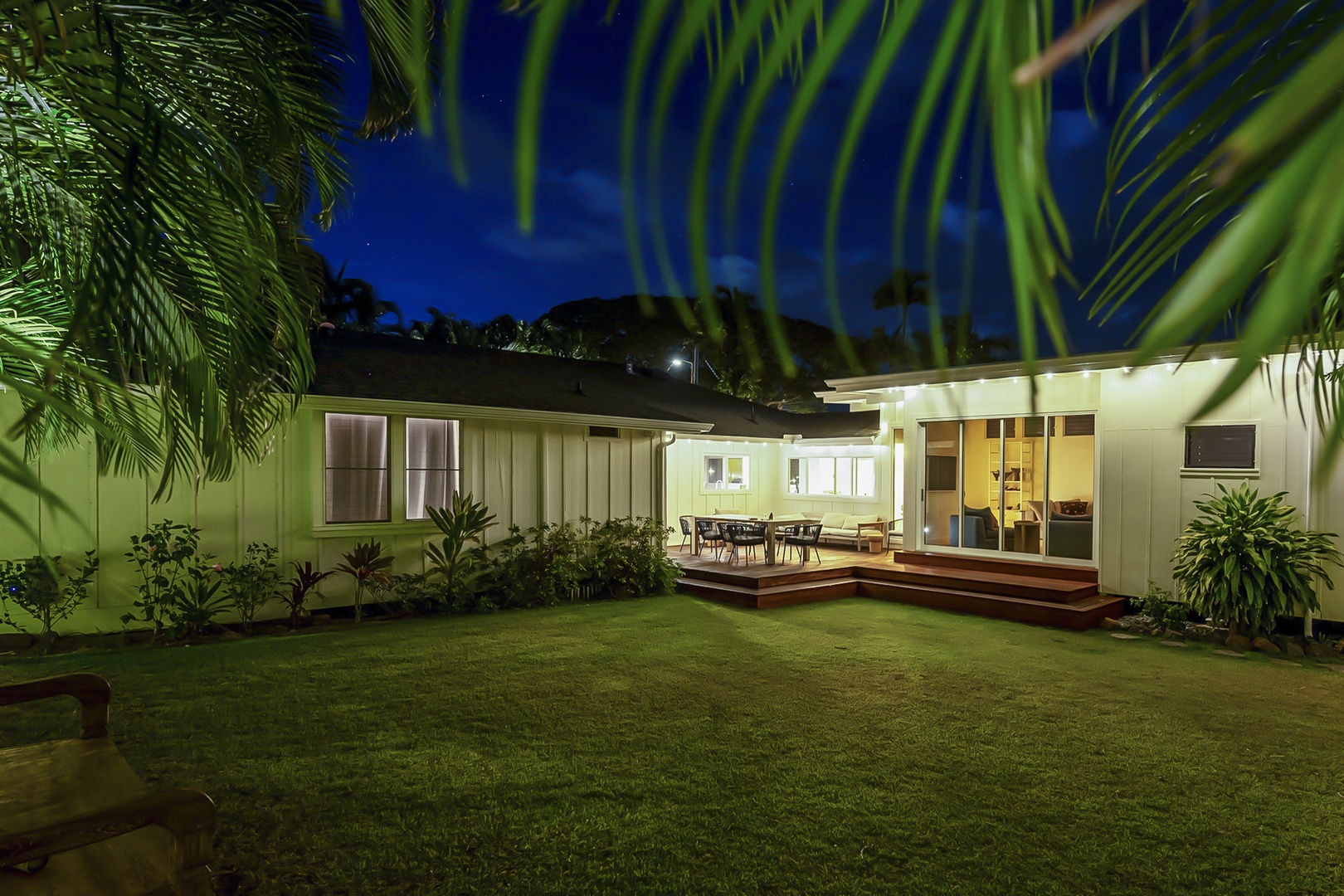 Kailua Vacation Rentals, Lanikai Ola Nani - After sunset, the backyard transforms into a magical setting—perfect for evening conversations and family celebrations under the stars.