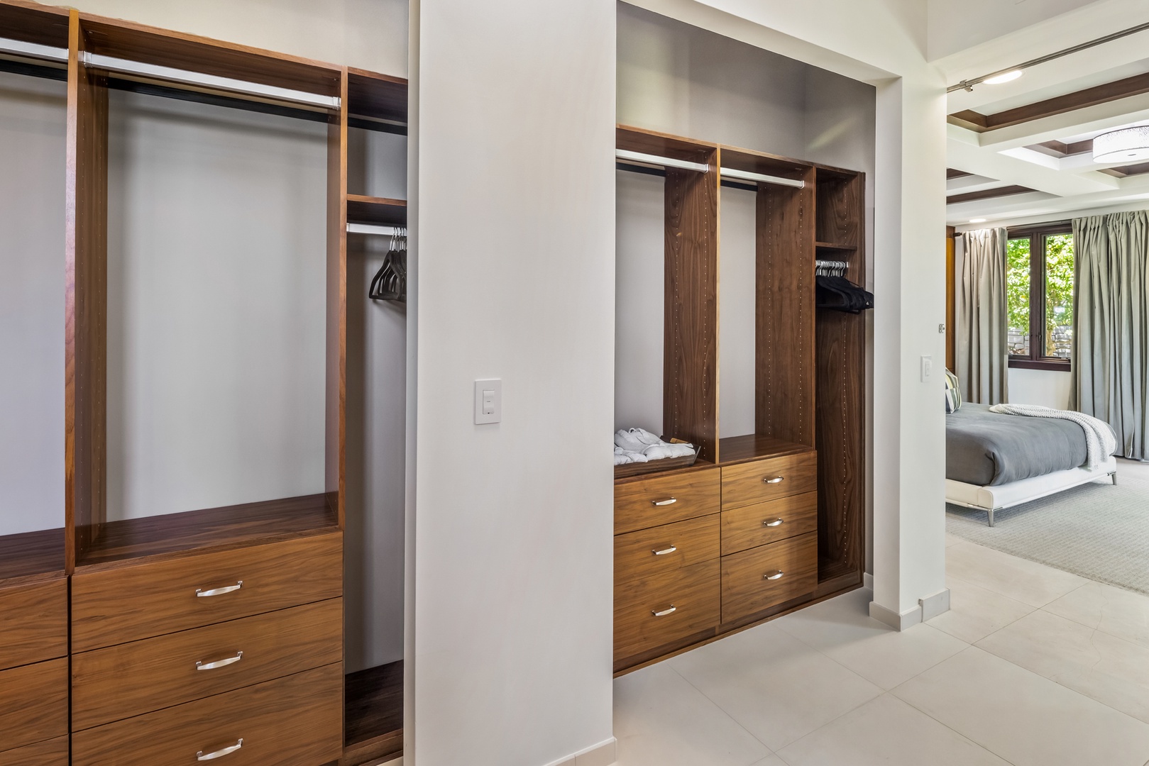 Honolulu Vacation Rentals, Kahala Grand Splendor - A beautifully crafted custom closet in the primary suite keeps everything organized in style.