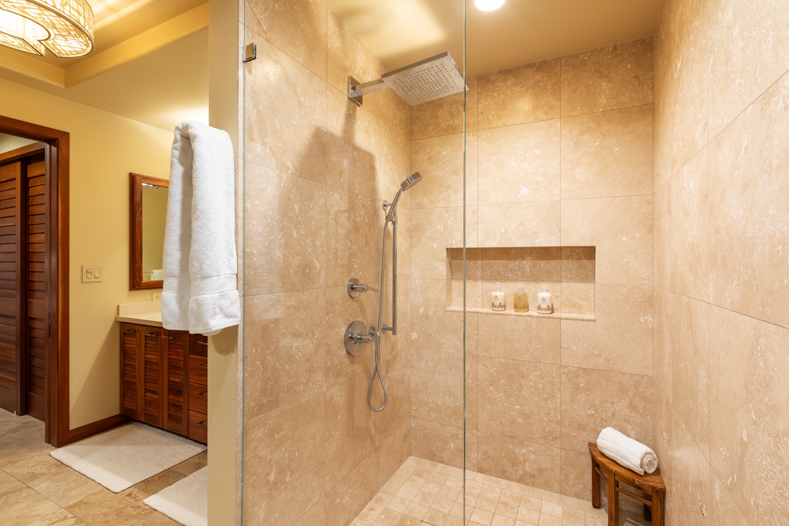 Kailua Kona Vacation Rentals, 2BD Hillside Villa (4102) at Hualalai Resort - Luxurious walk-in shower clad in natural stone.