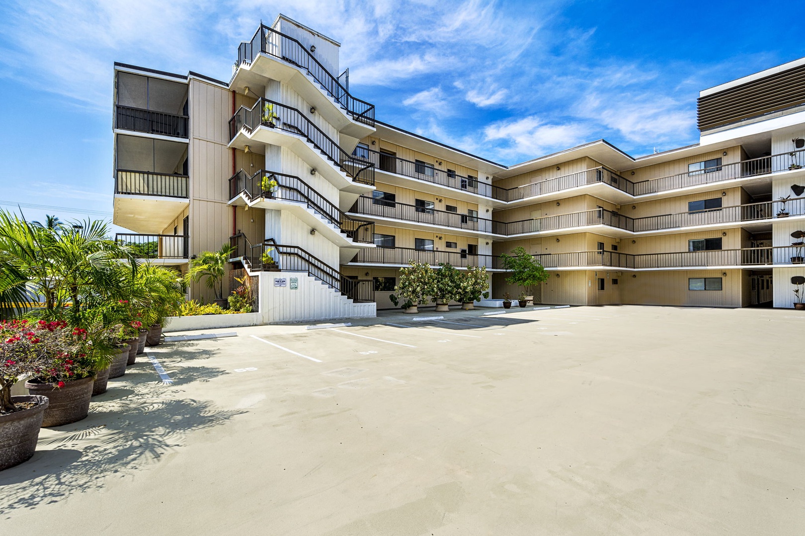 Kailua Kona Vacation Rentals, Kona Plaza 201 - Spacious courtyard showcasing the unique charm of the Kona Plaza Complex.