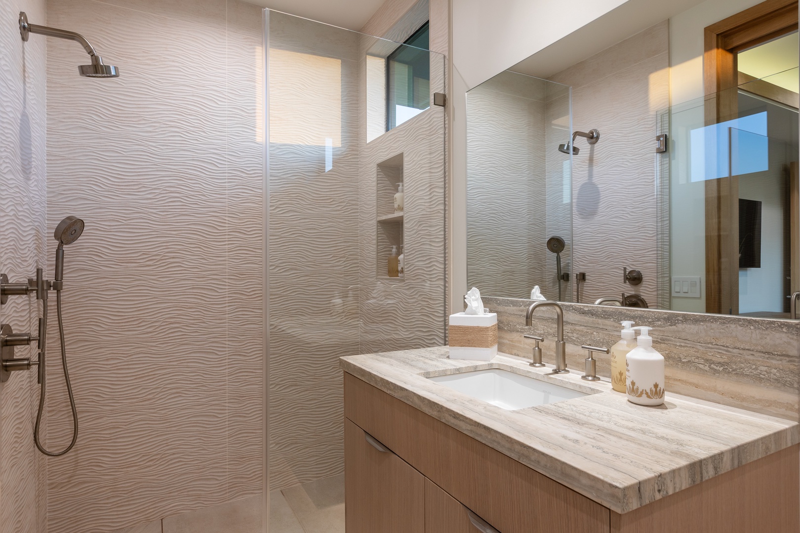 Kamuela Vacation Rentals, 5BD Mauna Lani Lux Ocean Estate (OE12) at One Ocean - Unwind in your spa-like bathroom featuring a luxurious walk-in shower and elegant marble vanity with premium amenities.