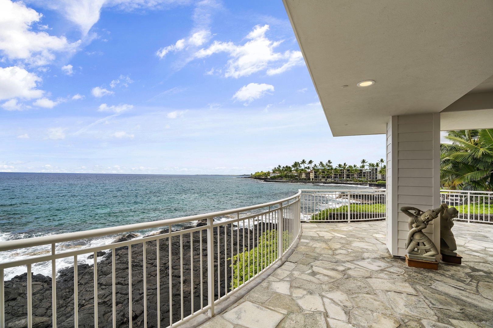 Kailua Kona Vacation Rentals, Ali'i Point #12 - Spacious lanai overlooking lava rock coastline—dine, lounge, and soak in the beauty of Kailua-Kona.