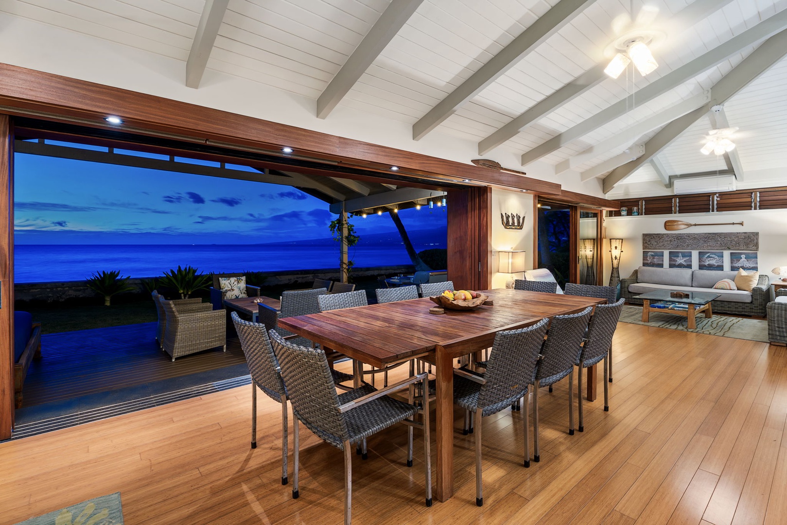 Kamuela Vacation Rentals, Island Time Retreat - Dinner on the deck with the last color draining out of the sky over the water.