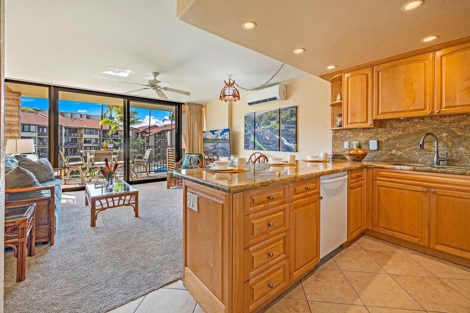 Lahaina Vacation Rentals, Papakea G-306 - The kitchen opens up to the living area, allowing you to cook while still being part of the conversation and enjoying the views from the lanai.