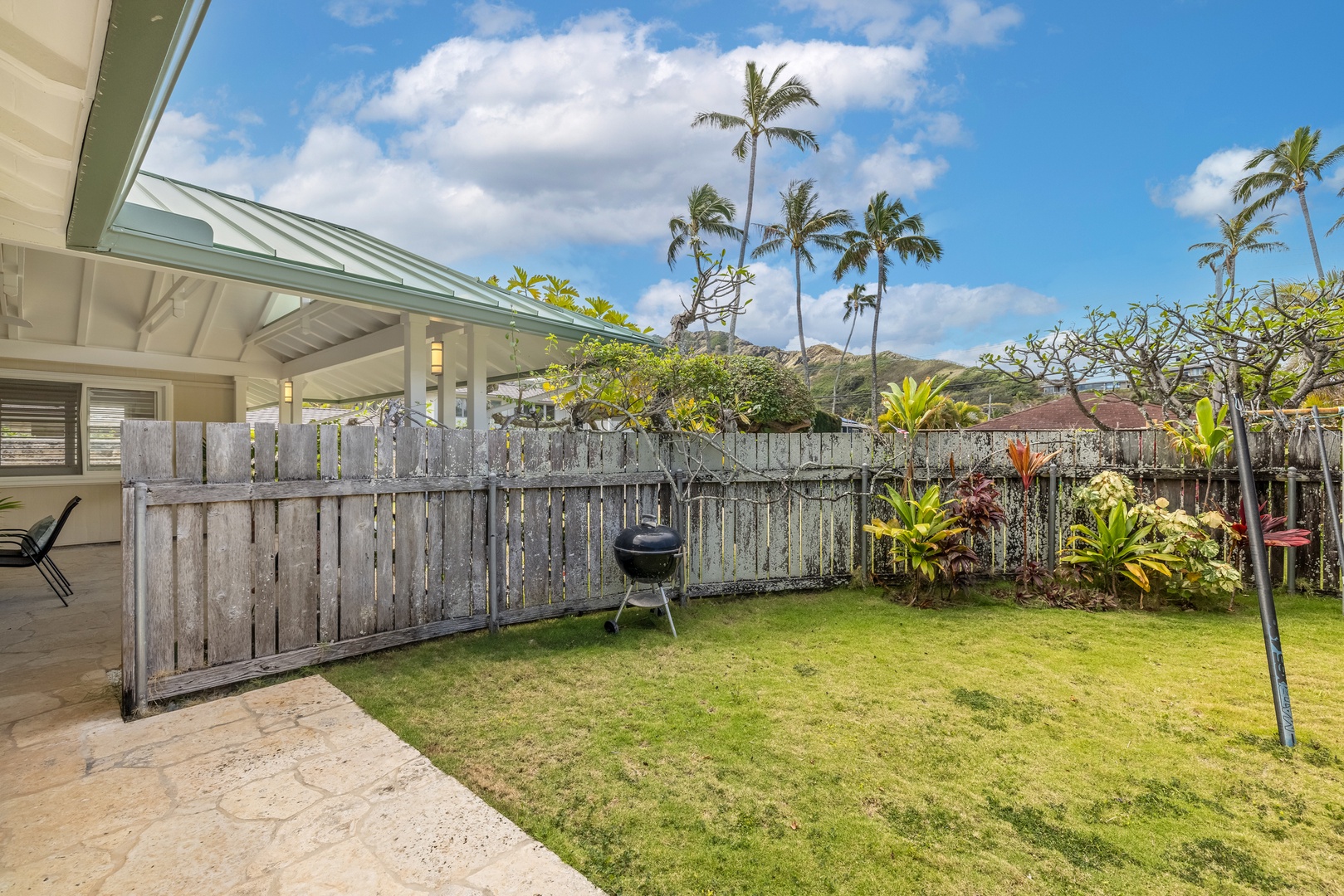 Kailua Vacation Rentals, Hale Moana Lanikai - Step outside to this charming backyard oasis, perfect for relaxation or hosting a barbecue